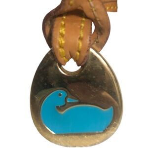 Authentic Dooney and Bourke rare blue purse charm.